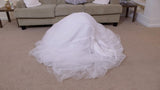 SHRINKING BRIDE IN HER WEDDING DRESS