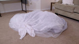 CHARLIE COCOONS IN HER WEDDING DRESS